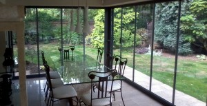 Double glazed, fully retractable, framless glass doors