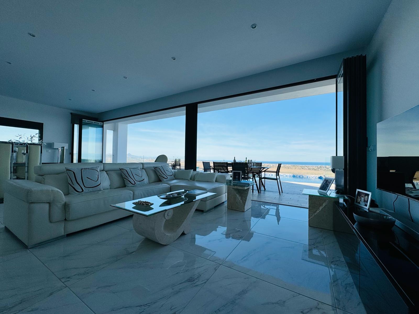 UltraSlim slide&pivot doors form a wall of glass or air on luxury villa sunseekerdoors.co.uk