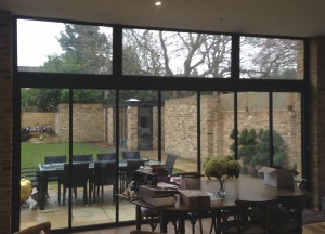 view of garden thru ultraslim doors