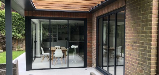 extension with UltraSlim slide-pivot-stack doors