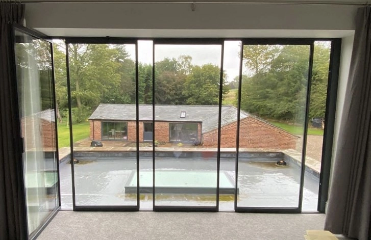 aluminium slide and fold doors partially open