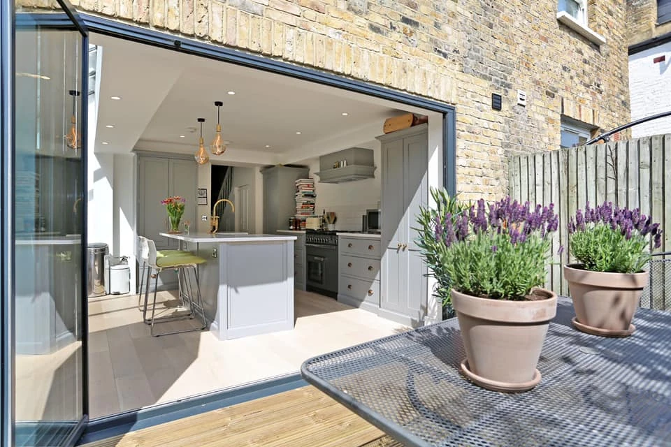 opened aluminium bifold patio doors