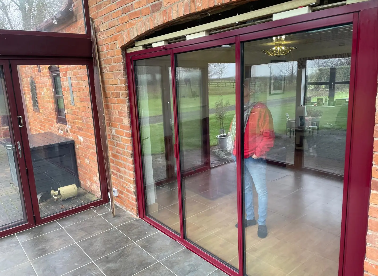 red aluminium concertina doors