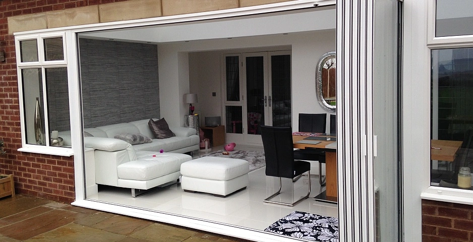 white external bifold doors open